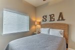Enjoy a peaceful nights sleep in this comfortable queen bed under the SEA